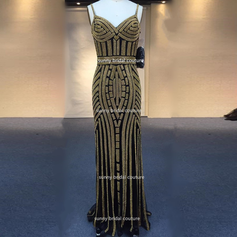black dress with gold stripes